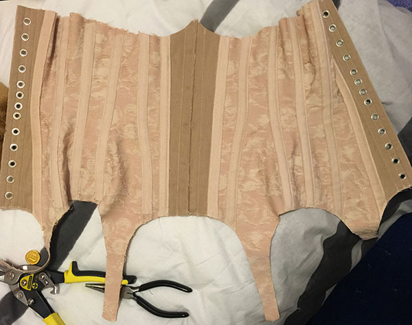 Corset pattern edges trimmed
