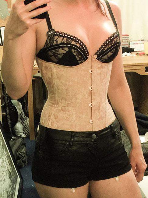Corset making complete! Front view with suspenders under shorts