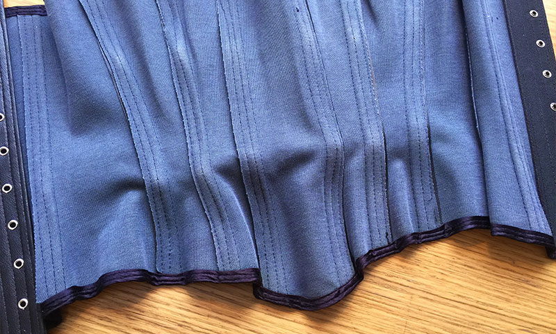 What does steel boned corset mean